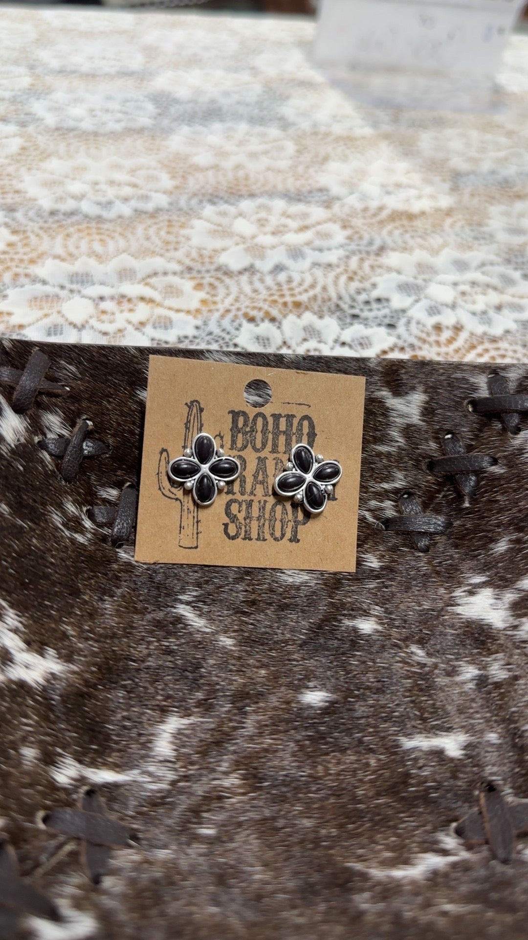 Black oval stud earrings