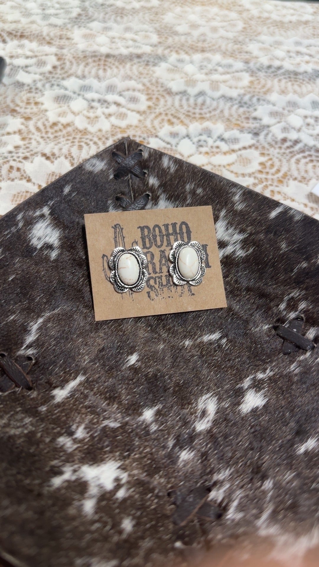 White oval earrings