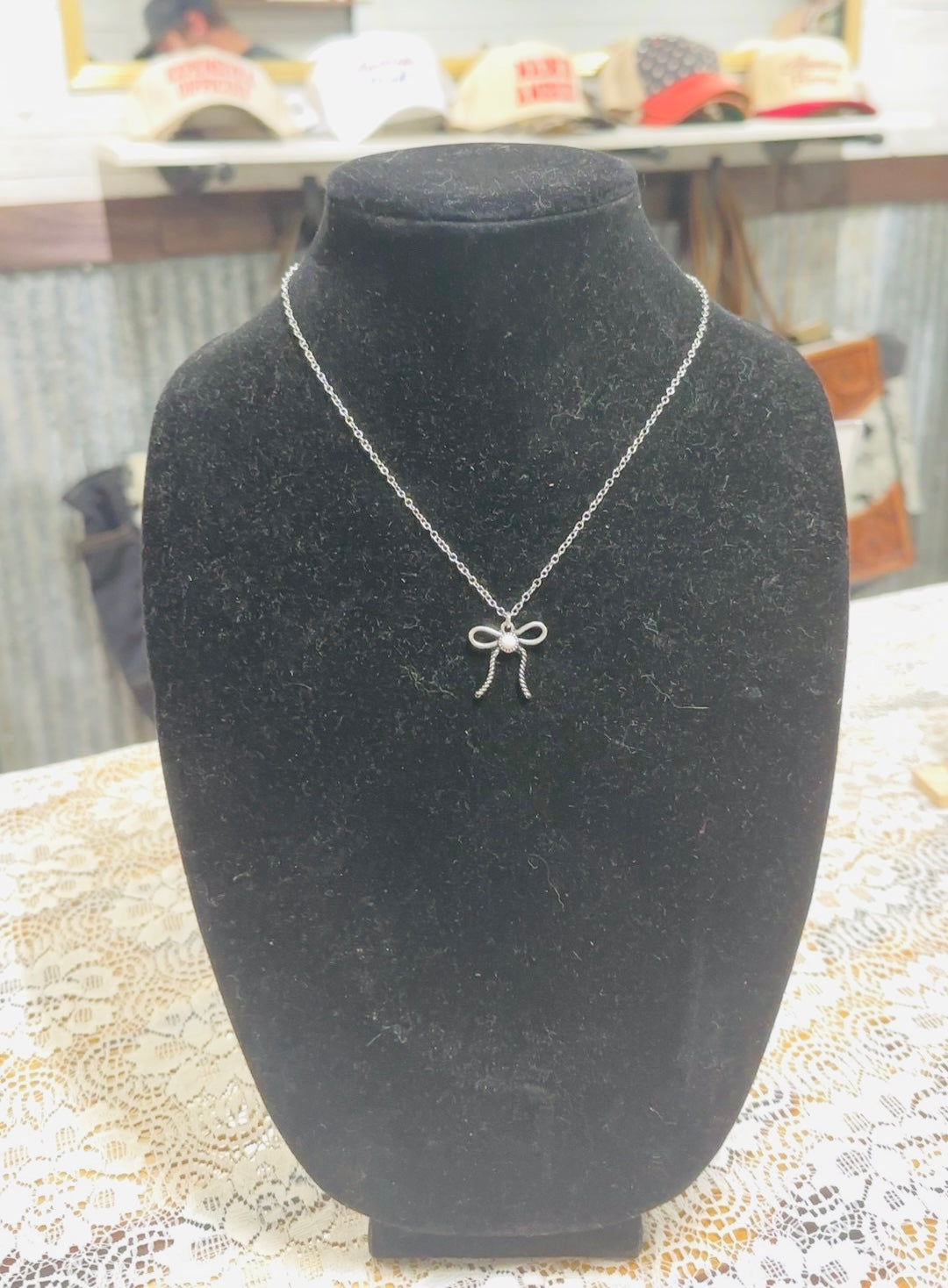 White bow necklace