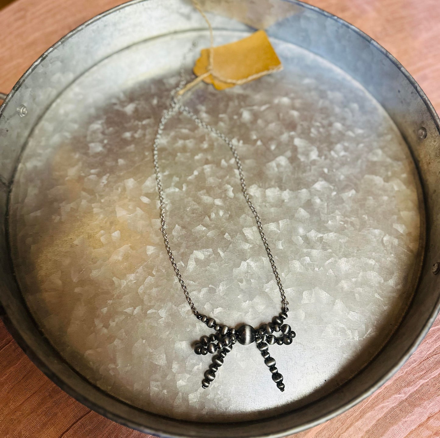 Navajo pearl chain bow necklace
